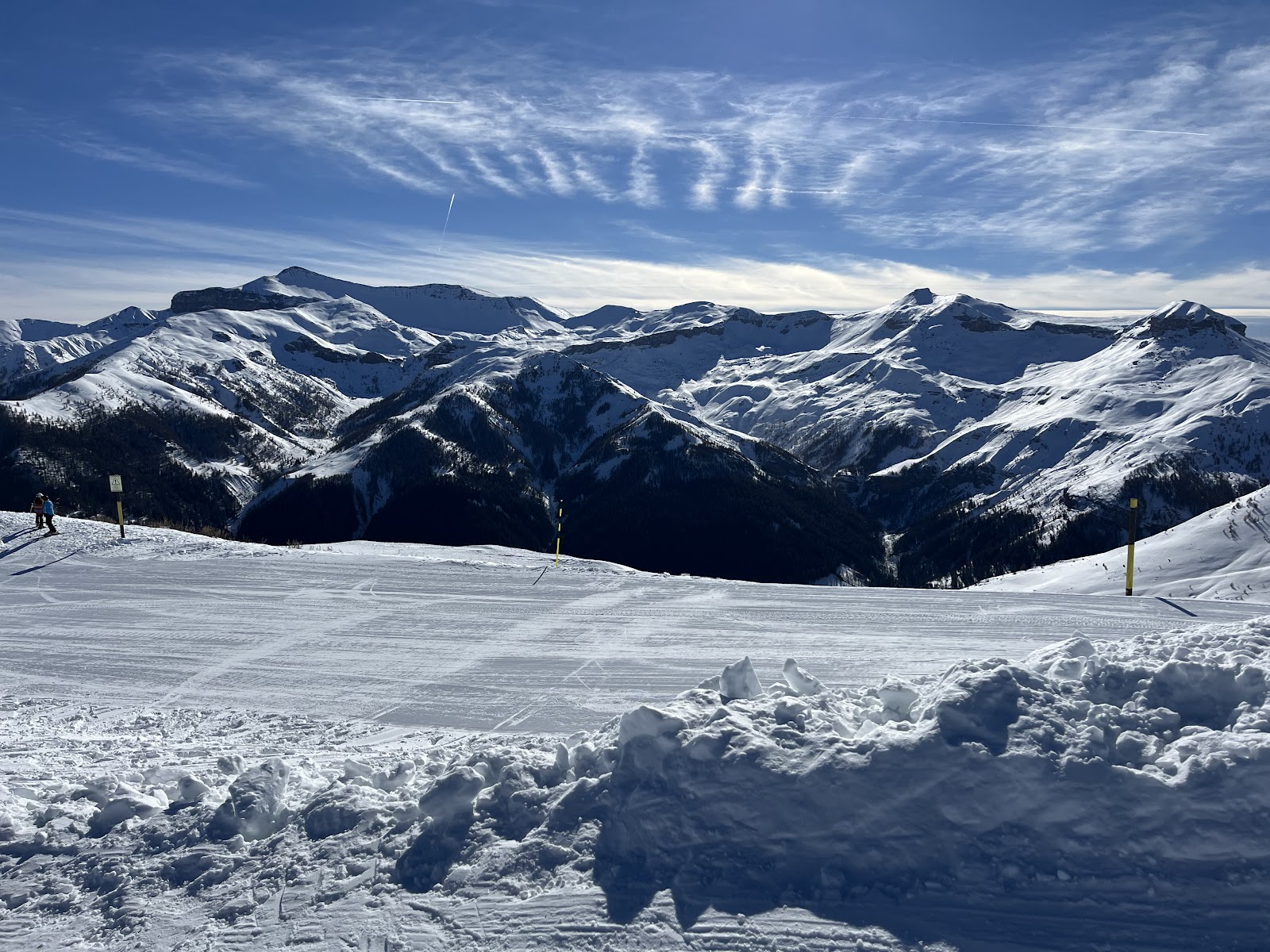 Wide groomed pistes catching the southern sun above Auron