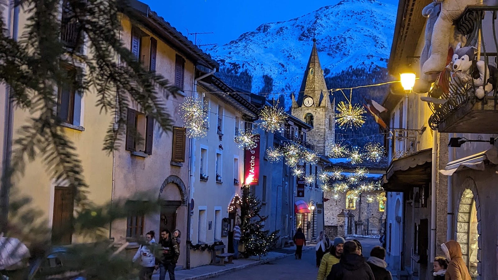 Traditional stone and timber chalets in Aussois under snow
