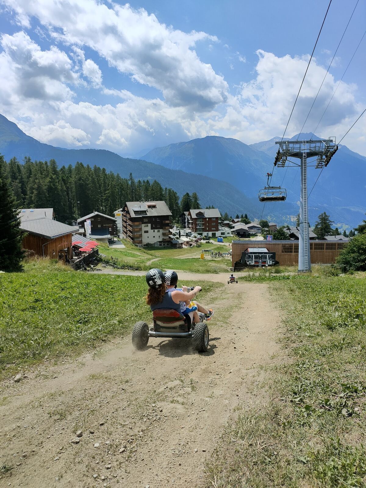 The chairlift rising toward the top station above Bellwald