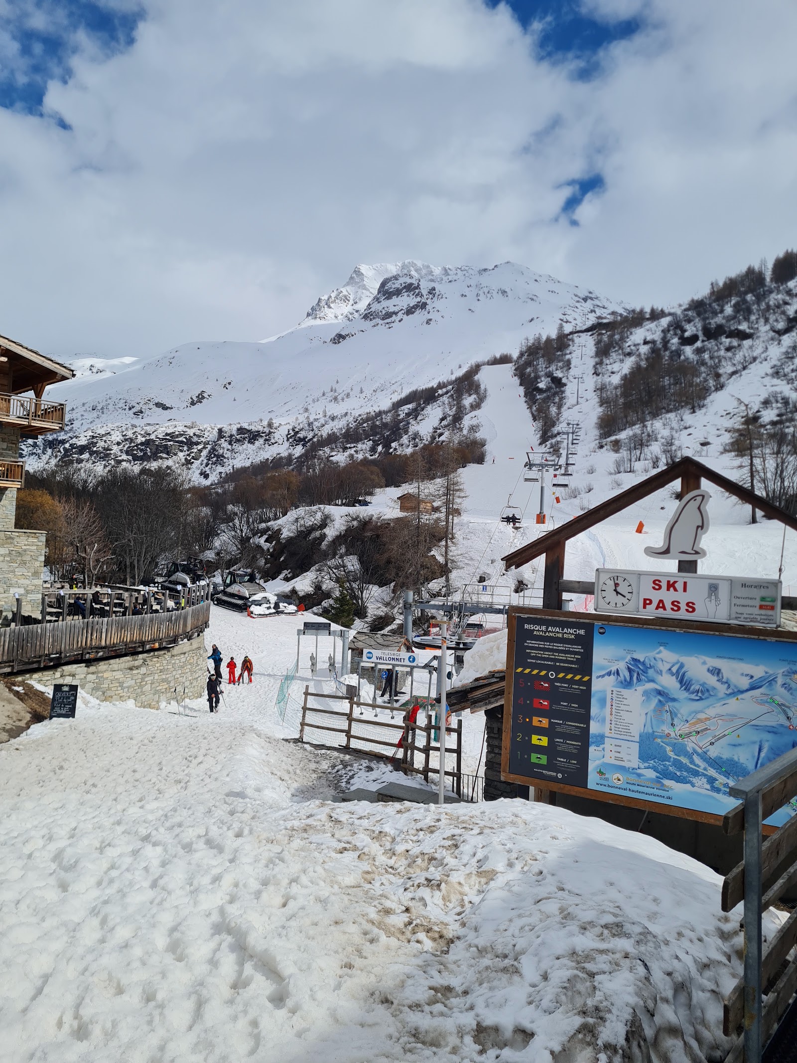 Ski tourers crossing a snowy slope near Bonneval sur Arc