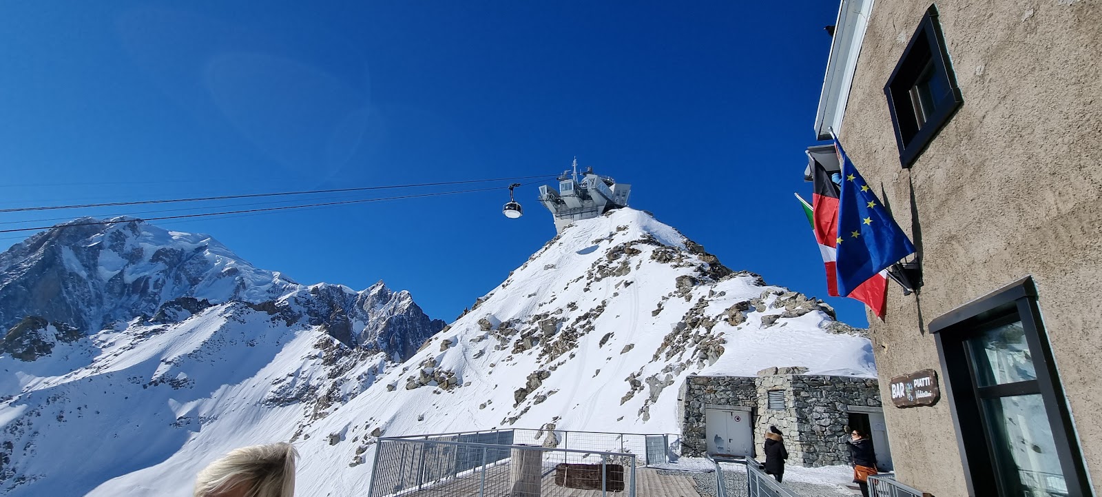 The Skyway Monte Bianco cable car climbing toward the high glaciers above Courmayeur