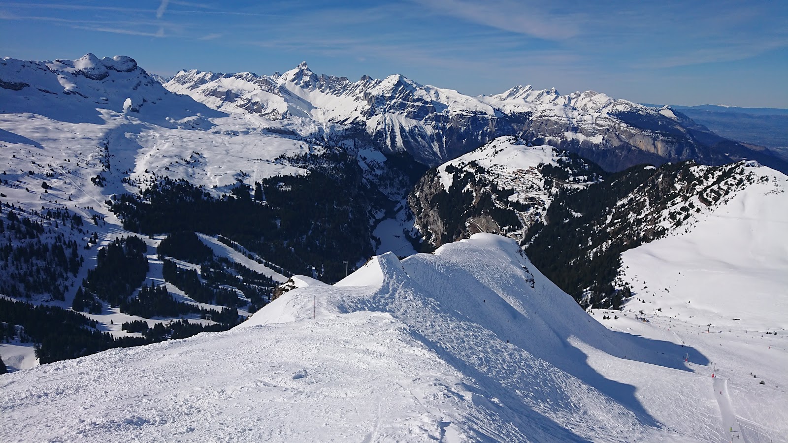 The bold concrete buildings of the Flaine resort center in winter