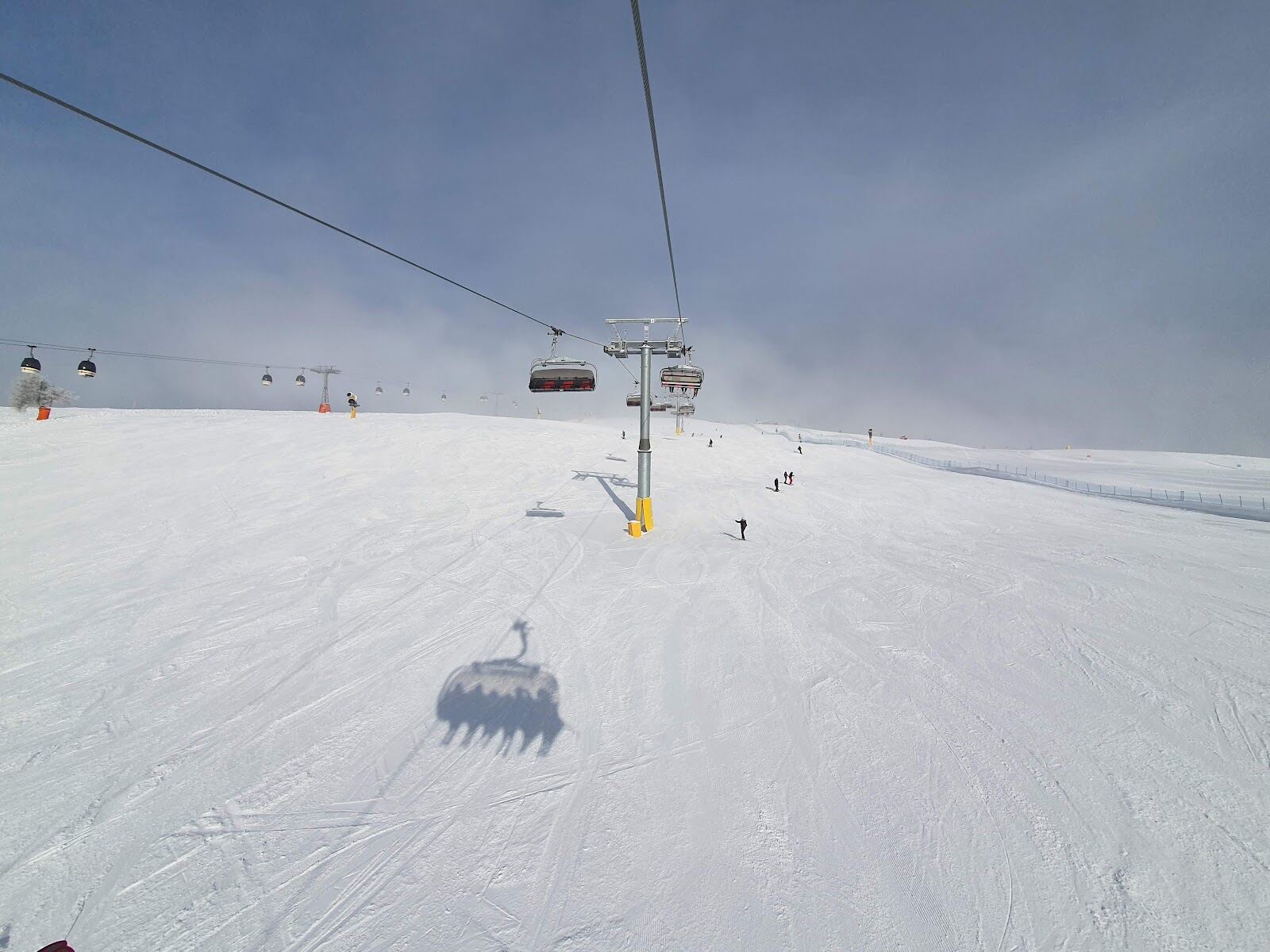 The broad Kronplatz summit dome above Bruneck in winter
