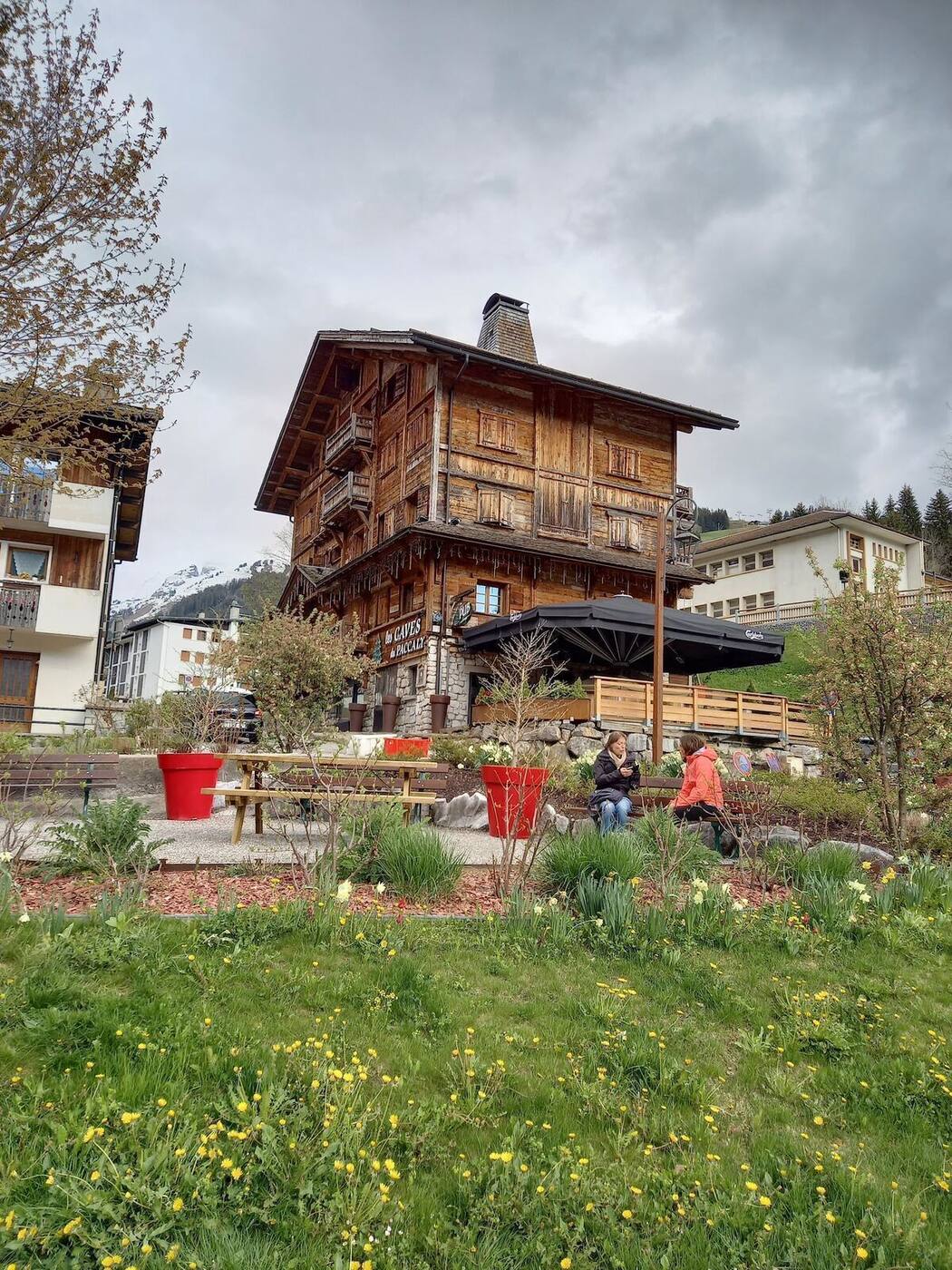 Snowy pistes and lifts above the village of La Clusaz