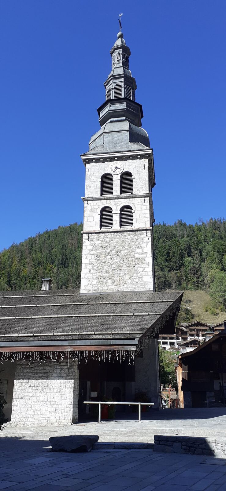 The traditional chalets and church of La Clusaz in winter