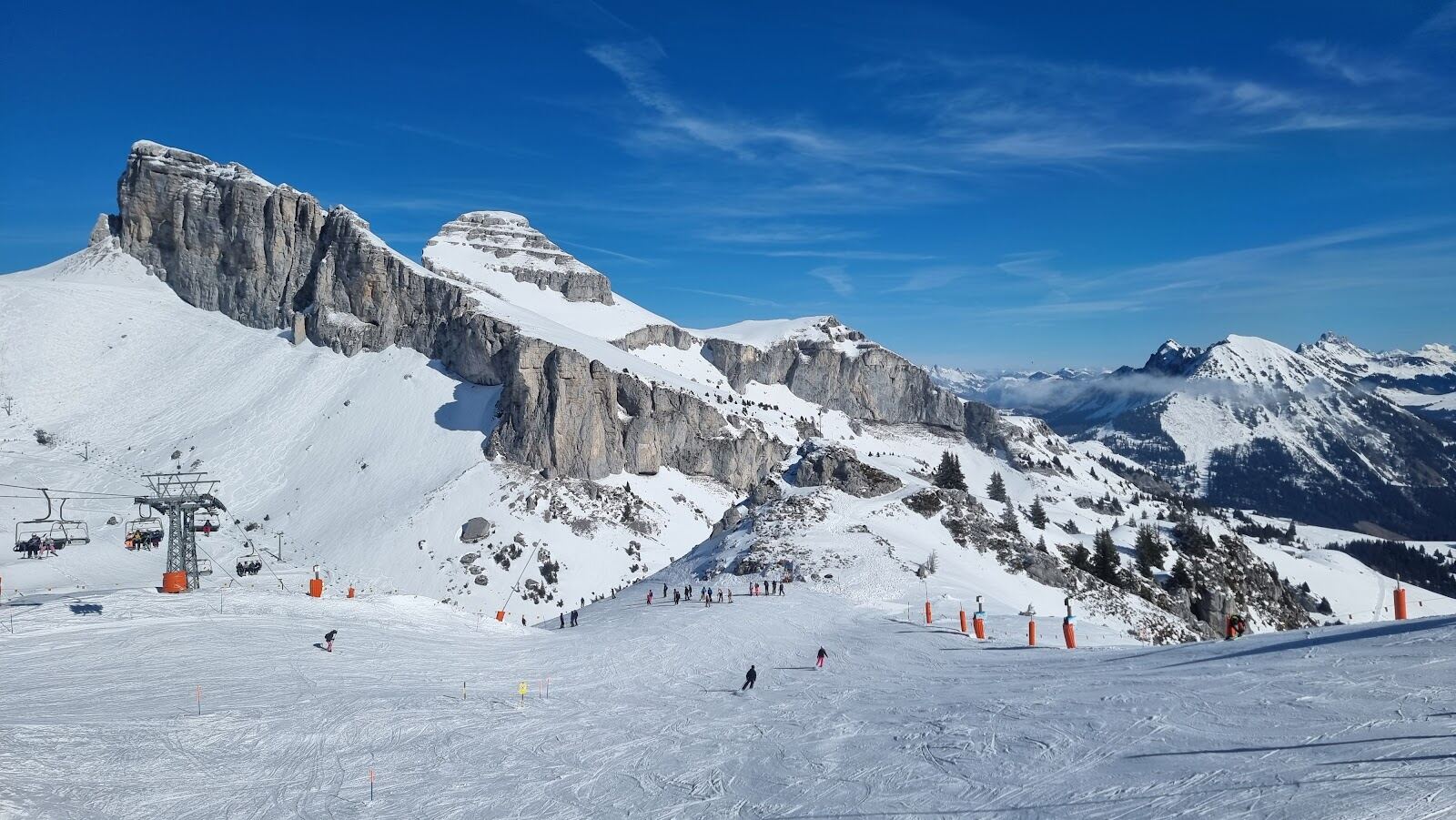 The Berneuse summit area above Leysin with the Tour d Ai cliffs behind
