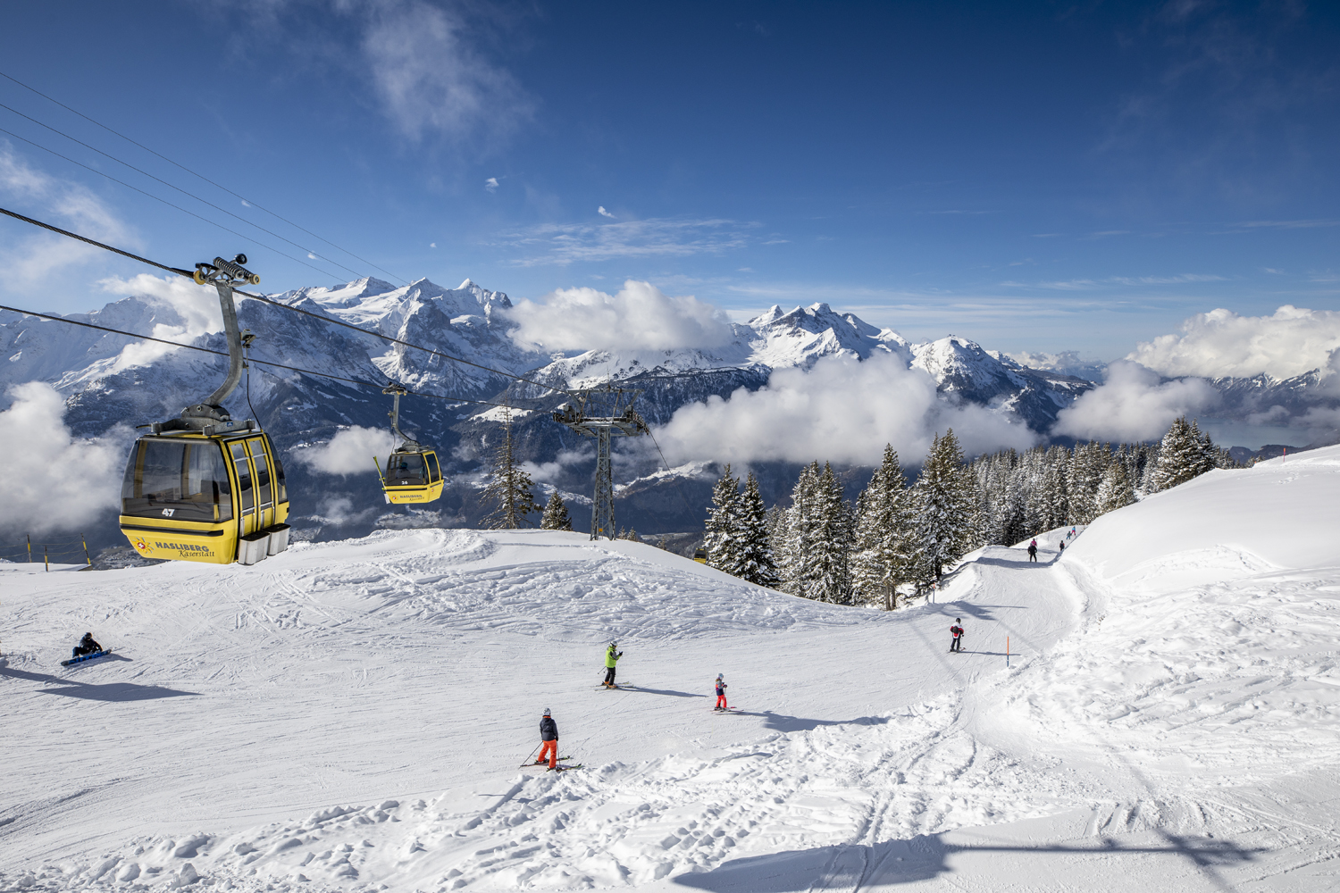 The sunny Hasliberg ski slopes above the Haslital valley in the Bernese Oberland