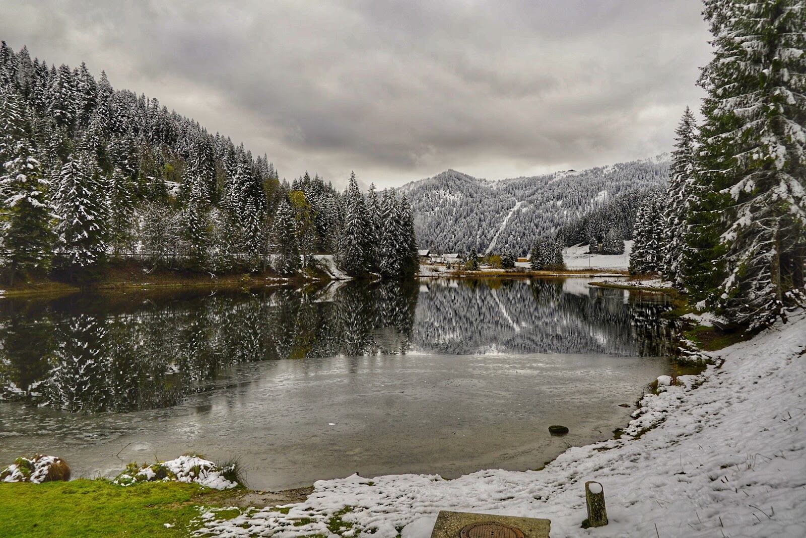 Snow covered Morgins valley and timber chalets