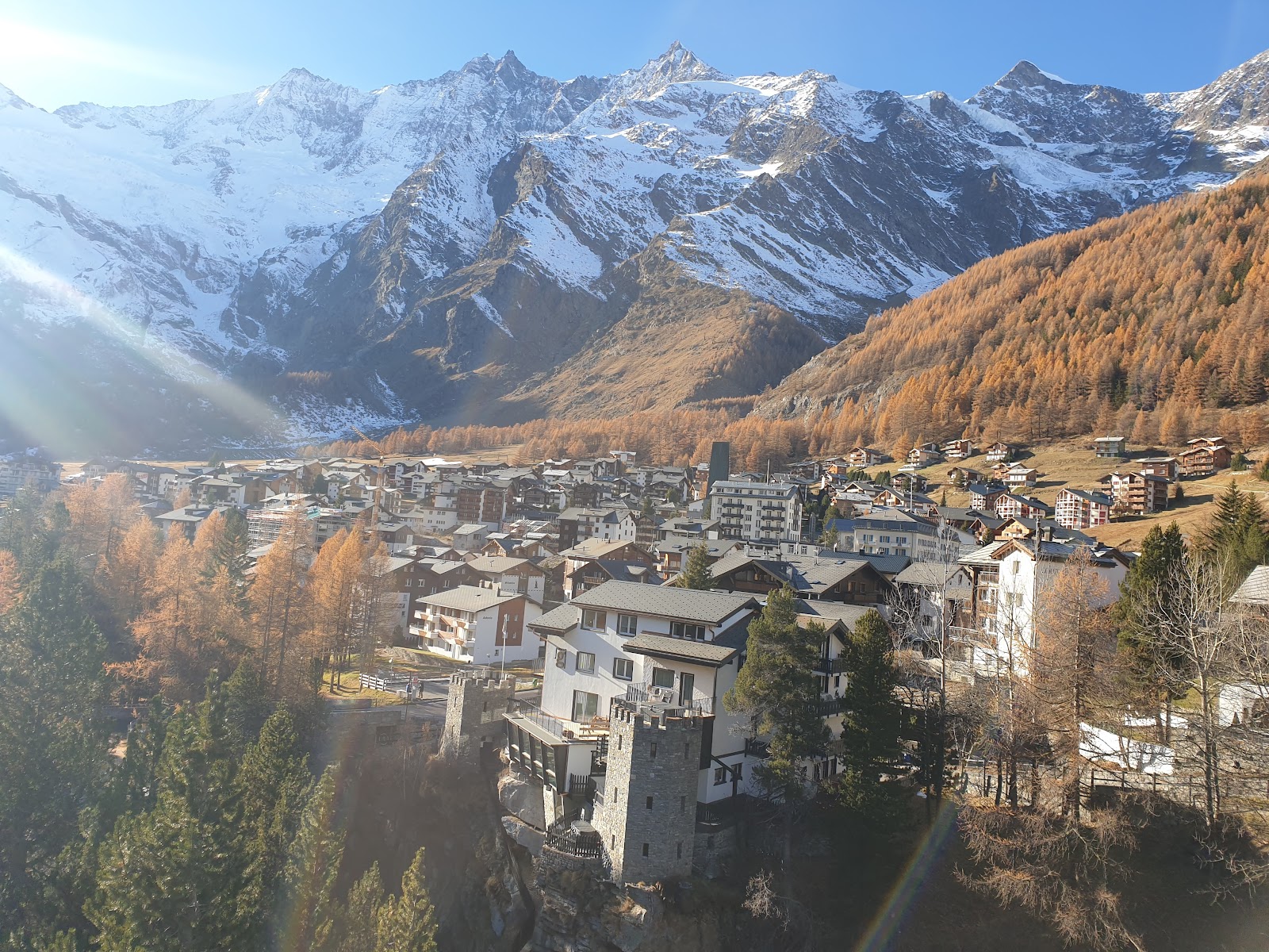 The car free glacier village of Saas Fee below snowy four thousand meter peaks