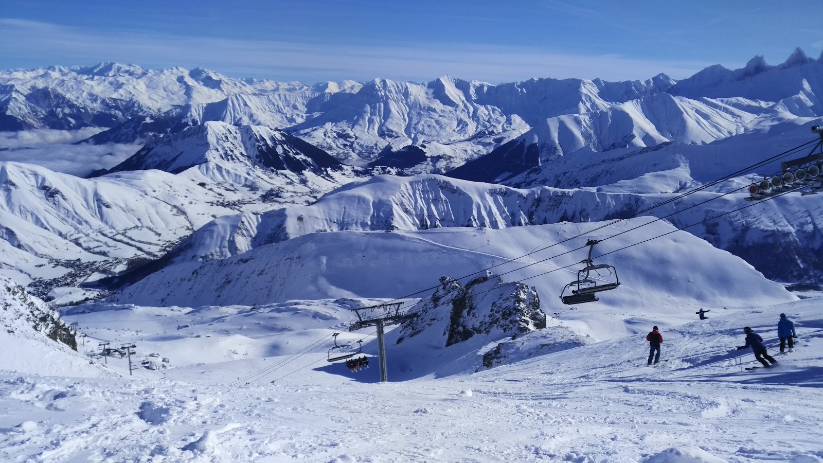 Wide open groomed pistes above Saint Sorlin d Arves in the Maurienne