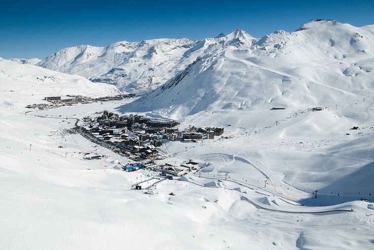 The high purpose built ski resort of Tignes beside a snowy mountain lake