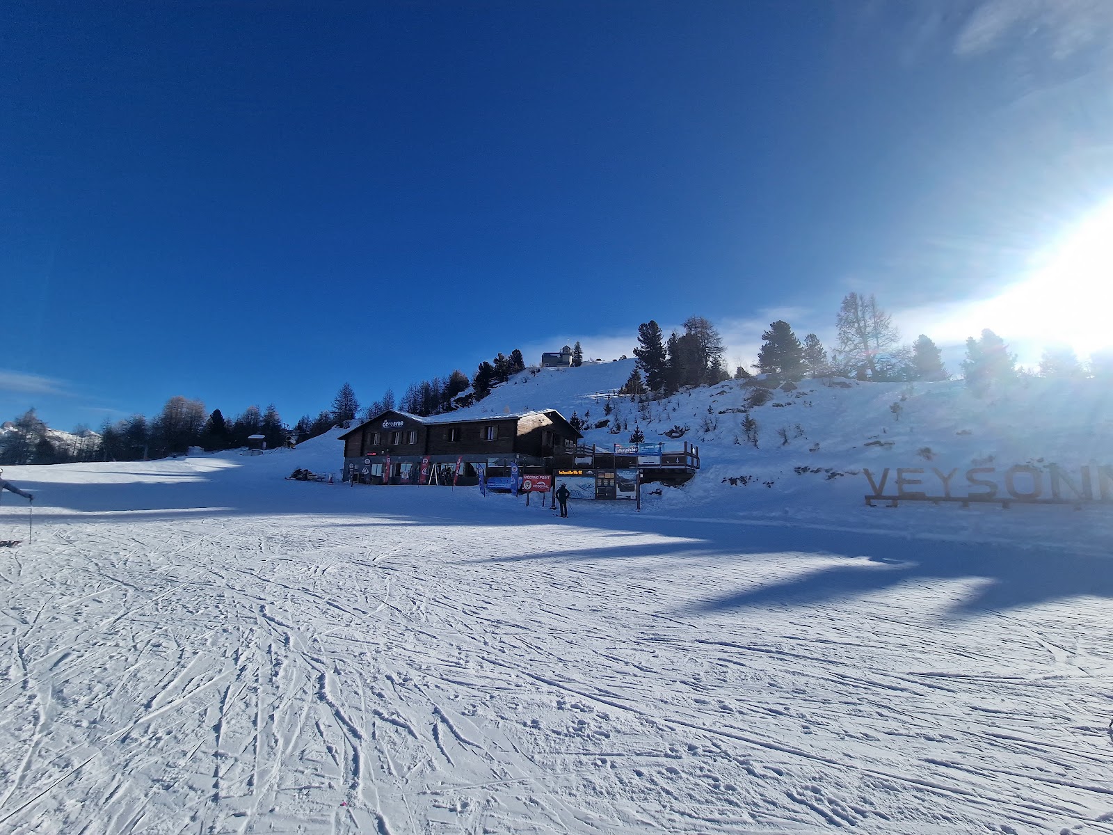 The chalet village of Veysonnaz on its terrace above the Rhone valley